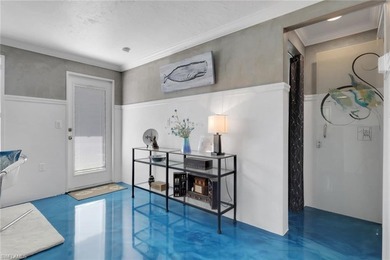 The Blue Cottage is a coastal mid-century showpiece set along - photo 3