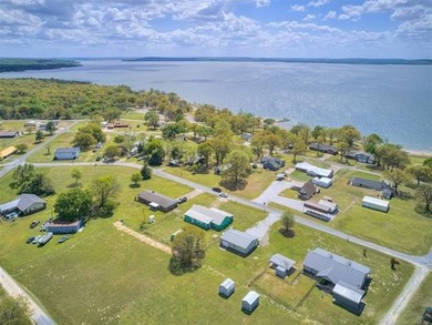 Lake life is calling-and this 4 bedroom, 2-bath home answers! - photo 4