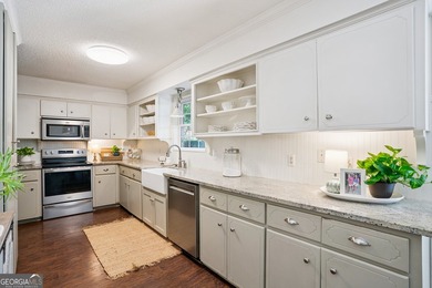 Welcome home to this charming 3-bedroom, 2-bath cottage-style - photo 11