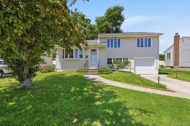Welcome to this beloved split-level home in the heart of Wantagh - photo 1