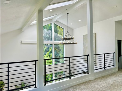 This beautifully remodeled home sits hidden, tucked away on a - photo 11