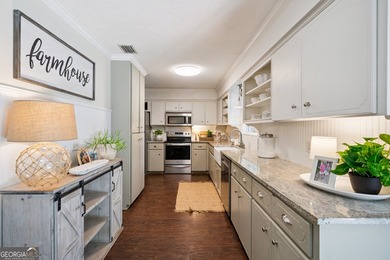 Welcome home to this charming 3-bedroom, 2-bath cottage-style - photo 12