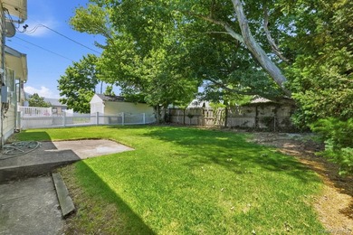 Welcome to this beloved split-level home in the heart of Wantagh - photo 4