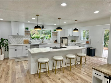 This beautifully remodeled home sits hidden, tucked away on a - photo 14