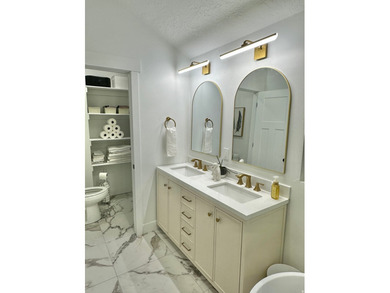 This beautifully remodeled home sits hidden, tucked away on a - photo 15