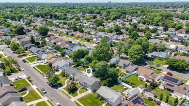 Welcome to this beloved split-level home in the heart of Wantagh - photo 6
