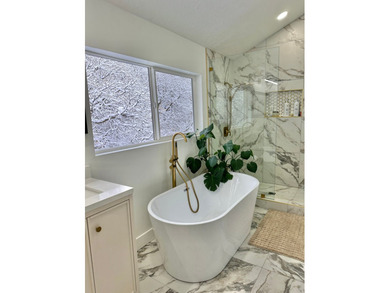 This beautifully remodeled home sits hidden, tucked away on a - photo 16