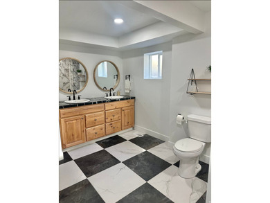 This beautifully remodeled home sits hidden, tucked away on a - photo 23