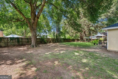 Welcome home to this charming 3-bedroom, 2-bath cottage-style - photo 25