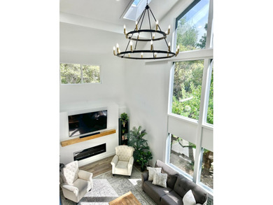 This beautifully remodeled home sits hidden, tucked away on a - photo 29