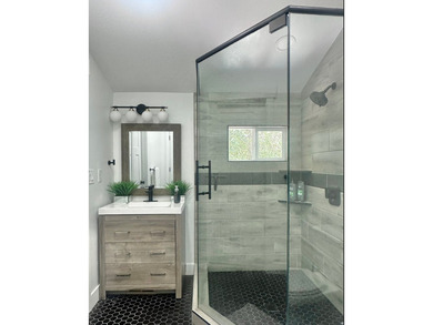 This beautifully remodeled home sits hidden, tucked away on a - photo 31