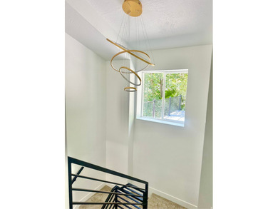 This beautifully remodeled home sits hidden, tucked away on a - photo 32