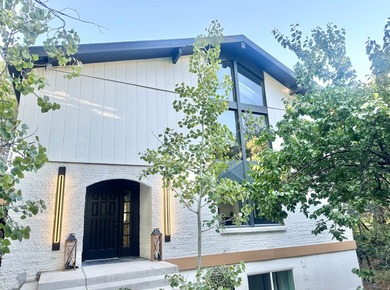 This beautifully remodeled home sits hidden, tucked away on a - photo 40