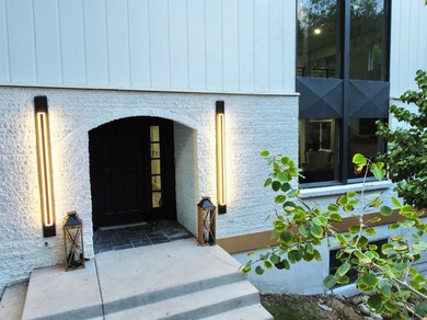 This beautifully remodeled home sits hidden, tucked away on a - photo 41