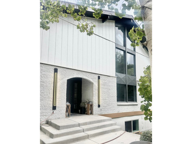 This beautifully remodeled home sits hidden, tucked away on a - photo 42