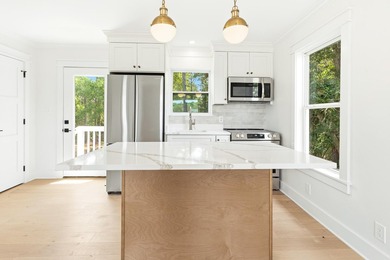 Welcome to 74 Pelican Bay Drive, a beautifully remodeled coastal - photo 44