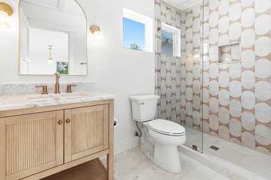 Welcome to 74 Pelican Bay Drive, a beautifully remodeled coastal - photo 50