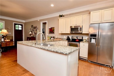 Discover this custom-built brick ranch situated on over an acre - photo 11