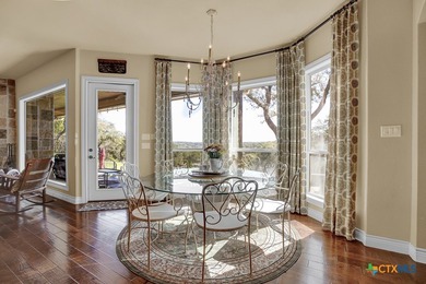 Timeless Hill Country Elegance on 10 secluded Acres with 5 acre