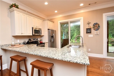 Discover this custom-built brick ranch situated on over an acre - photo 15