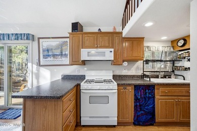 Nestled on a premium, private lot surrounded by towering pines - photo 17