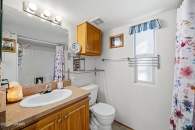 Nestled on a premium, private lot surrounded by towering pines - photo 21