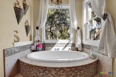 Timeless Hill Country Elegance on 10 secluded Acres with 5 acre