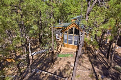 Nestled on a premium, private lot surrounded by towering pines - photo 27