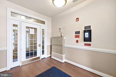 Stunning top-floor 2BR condo with elevator access and serene - photo 4