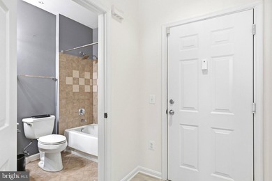 Stunning top-floor 2BR condo with elevator access and serene - photo 8