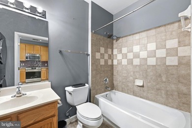 Stunning top-floor 2BR condo with elevator access and serene - photo 9