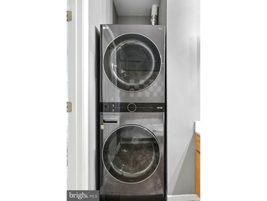 Stunning top-floor 2BR condo with elevator access and serene - photo 10