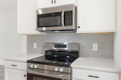 Located in the Shaftesbury Glen community with golf course views - photo 8