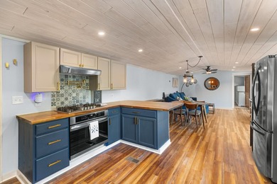 Welcome home to this charming, fully updated lake retreat on - photo 12