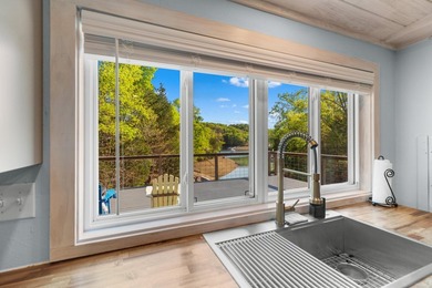 Welcome home to this charming, fully updated lake retreat on - photo 13