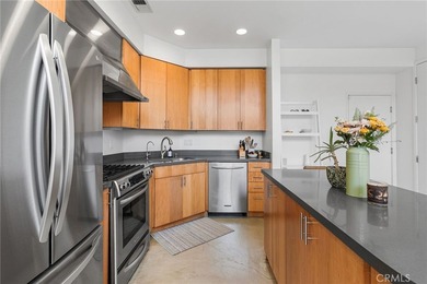 Behind privacy gates in the coveted Artist Lofts, this move-in - photo 13