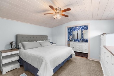 Welcome home to this charming, fully updated lake retreat on - photo 14