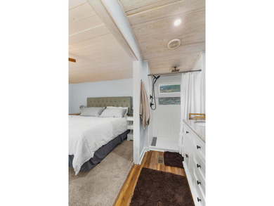 Welcome home to this charming, fully updated lake retreat on - photo 17