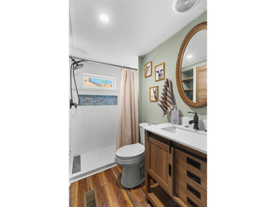 Welcome home to this charming, fully updated lake retreat on - photo 21