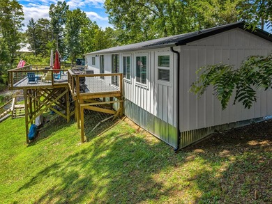 Welcome home to this charming, fully updated lake retreat on - photo 26