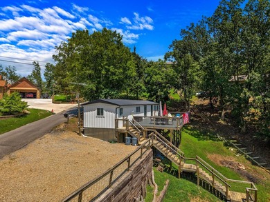 Welcome home to this charming, fully updated lake retreat on - photo 31
