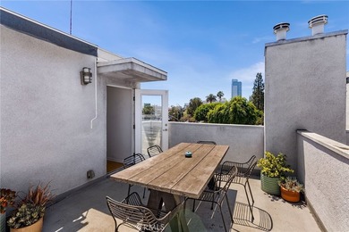 Behind privacy gates in the coveted Artist Lofts, this move-in - photo 37