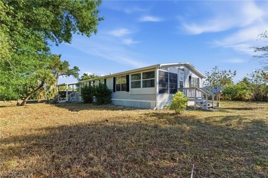 Welcome to the laid-back charm of Pine Island living! Nestled on - photo 3