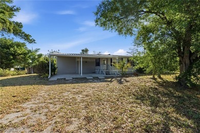Welcome to the laid-back charm of Pine Island living! Nestled on - photo 4