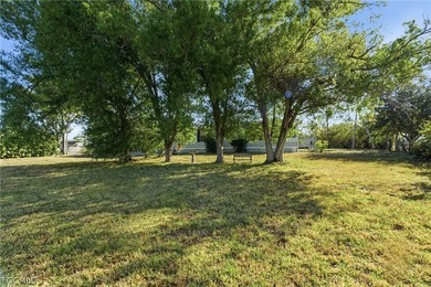 Welcome to the laid-back charm of Pine Island living! Nestled on - photo 5