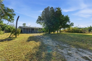 Welcome to the laid-back charm of Pine Island living! Nestled on - photo 6