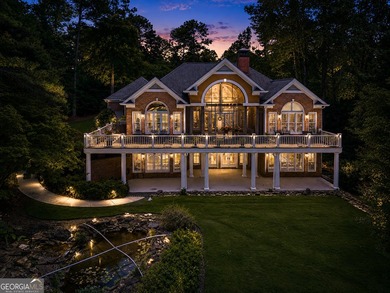 Nestled on 1.50 beautifully landscaped acres in the sought-after - photo 1