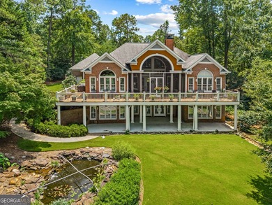 Nestled on 1.50 beautifully landscaped acres in the sought-after - photo 2