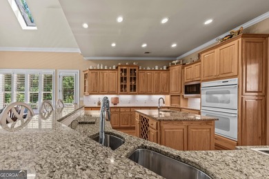 Nestled on 1.50 beautifully landscaped acres in the sought-after - photo 9