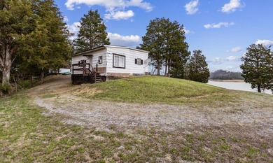 2.4 acres of lakefront property with open views and private - photo 5